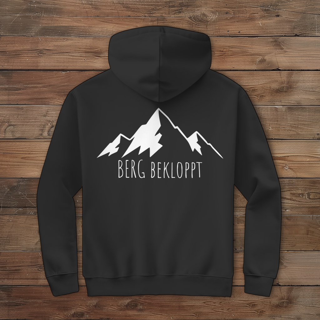 EIn schwarzer Hoodie mit Berg Bekloppt Design auf der Rückseite